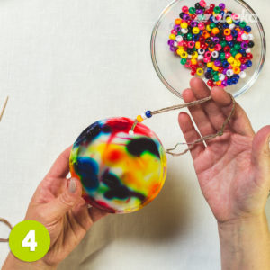 Putting beads above the suncatcher