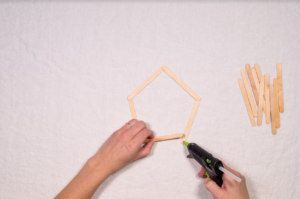 Attach Popsicle sticks