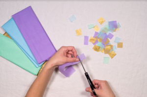 Cut tissue paper into squares