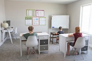 3 kids in a classroom