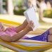 Girl reading in hammock